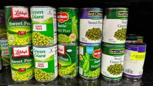 (47)- CANS OF PEAS