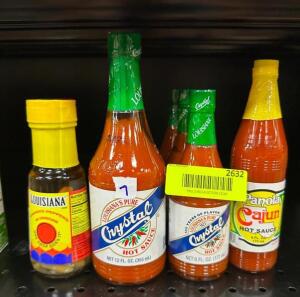 (7)- BOTTLES OF HOT SAUCE