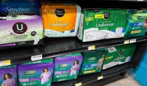 (5) ASSORTED PACKS OF FEMININE HYGIENE PRODUCTS.