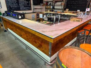 14' X 14' " U " SHAPED MARBLE TOP BAR WITH WOOD PANELING AND 2" BRUSHED CHROME FOOT RAIL.