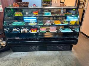 HUSSMANN 77" REFRIGERATED PASTRY CASE W/ CURVED GLASS FRONT.