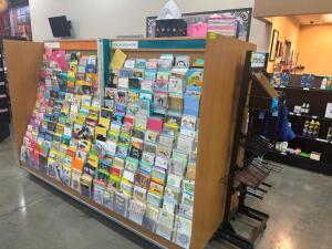 8' DOUBLE SIDED CARD DISPLAY RACK WITH CONTENTS.