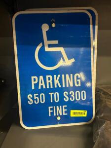 (2) HANDICAP PARKING SIGNS