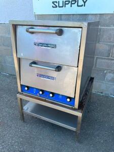 DESCRIPTION: BAKERS PRIDE DOUBLE STACK STONE PIZZA OVEN ( ELECTRIC ) BRAND / MODEL: BAKERS PRIDE P-44 ADDITIONAL INFORMATION SN# 560131302001, 208 VOL
