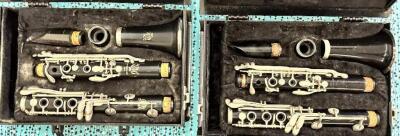 (2)- PLASTIC CLARINETS