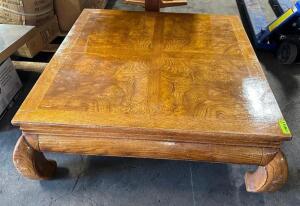 48" X 48" HARDWOOD COFFEE TABLE.