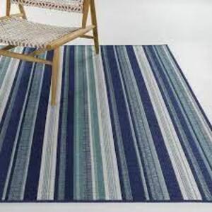 DESCRIPTION: (2) INDOOR/OUTDOOR AREA RUGS INFORMATION: BLUE AND WHITE WITH ACCENTS SIZE: 9' X 12' RETAIL$: $80.70 EA QTY: 2