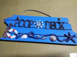 DESCRIPTION: (3) WALL HANGING SIGNS BRAND/MODEL: "POOP DECK" INFORMATION: SAILOR THEMED SIZE: BLUE RETAIL$: $15.99 EA QTY: 3