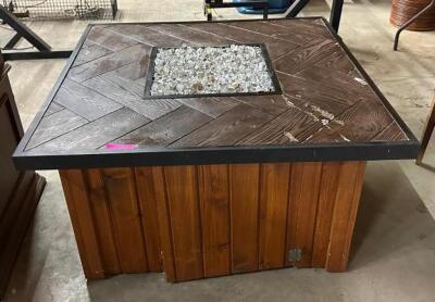 DESCRIPTION: OUTDOOR PROPANE FIRE PIT TABLE INFORMATION: DAMAGE TO TOP - SEE PHOTOS SIZE: 38"X38"X21" QTY: 1