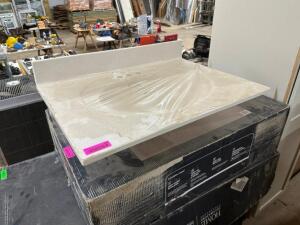 NAME: 31" X 22" VANITY TOP DESCRIPTION: 31" X 22" VANITY TOP THIS LOT IS: ONE MONEY QTY: 1