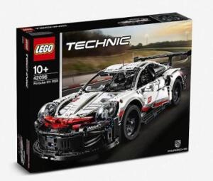 DESCRIPTION: (1) LEGO TECHNIC PORSCHE SET BRAND/MODEL: 42096 INFORMATION: 1580-PIECES/WHITE, RED & BLACK RETAIL$: $165.00 SIZE: 5"H X 19"L X 7"W QTY: