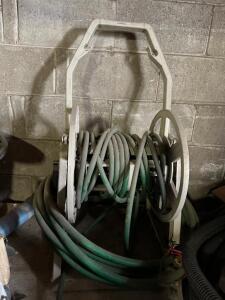 HOSE REEL WITH ADDITIONAL CONTENTS OF SHELF