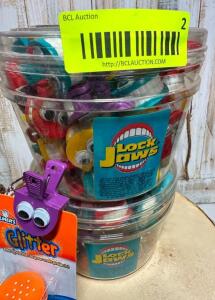 DESCRIPTION: (2) CONTAINERS OF LOCK JAW TOYS QTY: 2
