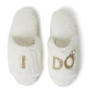 DESCRIPTION: (4) PAIRS OF BRIDAL SLIPPERS BRAND/MODEL: WHITE INFORMATION: "I DO" SIZE: WOMENS LARGE RETAIL$: $17.99 EA QTY: 4