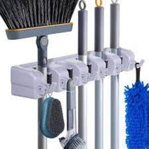 DESCRIPTION: (2) MOP AND BROOM HOLDER BRAND/MODEL: 5 POSITION 6 HOOKS INFORMATION: GRAY RETAIL$: $23.42 EA QTY: 2