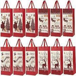 DESCRIPTION: (2) BAG OF WINE GIFT BAGS BRAND/MODEL: JUVALE INFORMATION: MULTI DESIGNS SIZE: CHRISTMAS GLITTER RETAIL$: $16.49 EA QTY: 2