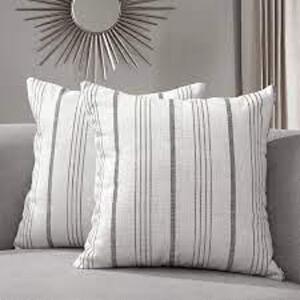 DESCRIPTION: (1) DECORATIVE PILLOW COVER BRAND/MODEL: SUNLIT INFORMATION: WHITE WITH BLACK SIZE: 18" RETAIL$: $18.99 EA QTY: 1