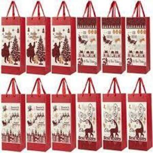 DESCRIPTION: (2) BAG OF SPARKLEY WINE GIFT BAGS BRAND/MODEL: JUVALE INFORMATION: MULTI DESIGNS RETAIL$: $16.49 EA QTY: 2