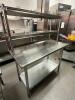 48" X 24" STAINLESS TABLE W/ RISER SHELF. - 2