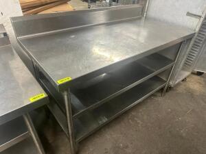 DESCRIPTION 60" X 30" ALL STAINLESS TABLE W/ 6" BACK SPLASH ADDITIONAL INFORMATION W/ UNDER SHELVES. SIZE 60" X 30" LOCATION BAY 6 QTY 1