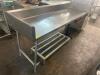 DESCRIPTION 96" X 32" ALL STAINLESS TABLE W/ 8" BACK SPLASH. ADDITIONAL INFORMATION RIGHT SIDE LEGS ARE BENT. NEED REPAIR SIZE 96" X 32" LOCATION BAY