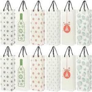 DESCRIPTION: (1) BAG OF WINE GIFT BAGS BRAND/MODEL: JUVALE INFORMATION: MULTI DESIGNS RETAIL$: $16.49 EA QTY: 1