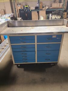 DESCRIPTION: (1) STORAGE CABINET WITH WORK TOP, TOP NOT ATTACHED INFORMATION: STAINLESS STEEL TOP SIZE: 12 DRAWERS QTY: 1