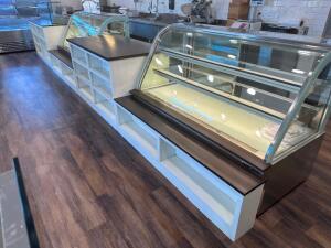 30' SALES DISPLAY COUNTER WITH MAPLE HARDWOOD TOPS AND WHITE ENGINEERED BASES. IN (6) SECTIONS.