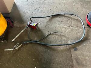 12 VOLT ELECTRIC FUEL PUMP W/ HOSE AND NOZZLE.