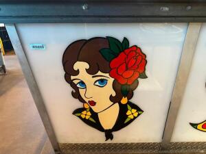 26" X 32" SAILOR JERRY INSPIRED ART WORK ON PLASTIC PANEL. "WOMAN W/ FLOWER"