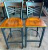 (2) CROSS BACK METAL BAR STOOLS W/ WOODEN SEATS