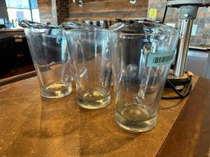 (3) 64 OZ GLASS PITCHERS.