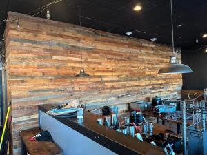 ALL OF THE BARN WOOD WALL PANELING IN THE RESTAURANT.