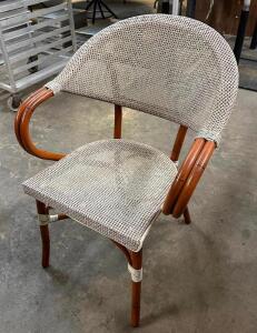 (4) WOODEN FRAME BARREL BACK CHAIRS W/ WICKER SEATS.