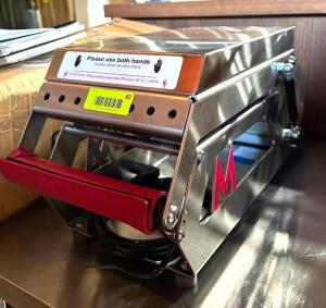 DESCRIPTION: CIMICRO TRAY SEALER INFORMATION: COMES WITH TRAYS - SEE PHOTOS LOCATION: DINING AREA QTY: 1