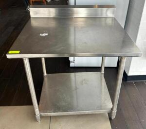 DESCRIPTION: 3' STAINLESS STEEL TABLE WITH UNDERSHELF SIZE: 36"X30" LOCATION: COOLER ROOM QTY: 1