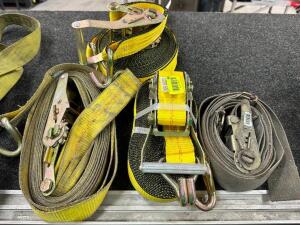 (4) YELLOW RATCHET STRAPS.