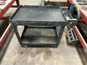 TWO TIER BLACK PLASTIC UTILITY CART.