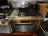 FOUR BURNER RANGE W/ TWO BURNER GRIDDLE AND LOWER OVEN. - 2