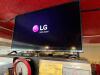 LG 50" FLAT SCREEN TV W/ MOUNT AND REMOTE. - 2