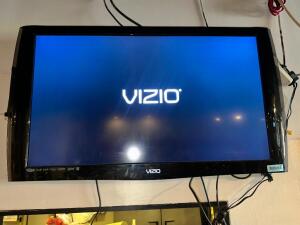 VIZIO 42" FLAT SCREEN TV W/ WALL MOUNT.