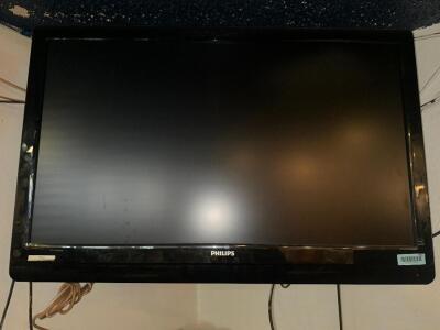 PHILLIPS 42" FLAT SCREEN TV W/ WALL MOUNT.