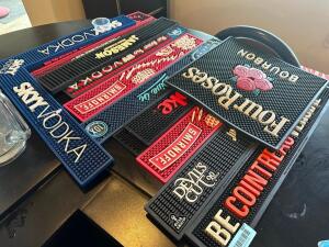 (1) LOT OF ASSORTED BAR MATS.