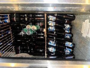 CONTENTS OF BAR COOLER - APPROX 90 BOTTLES OF BEER.