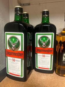 (3) UN-OPENED BOTTLES OF JAGERMEISTER AND (1) MOSTLY FULL BOTTLE