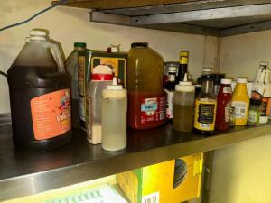 CONTENTS OF SHELF - ASSORTED SPICES AND SEASONINGS