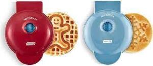 DESCRIPTION: (2) MINI WAFFLE MAKER BRAND/MODEL: DASH INFORMATION: GINGERBREAD MAN AND EASTER EGG RETAIL$: $10.00 EA QTY: 2