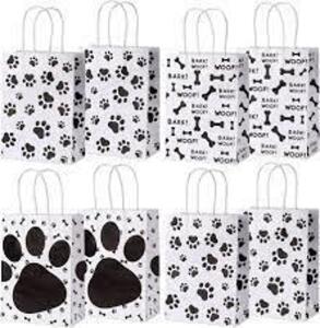 DESCRIPTION: (1) CASE OF (32) PARTY KIT PACKS BRAND/MODEL: WHITE KRAFT INFORMATION: DOGS DESIGN RETAIL$: PARTY FAVOR BAGS QTY: 1