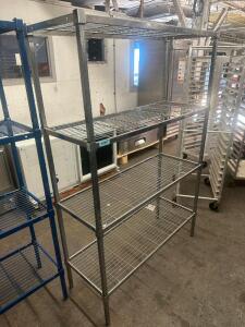 48" X 18" FOUR TIER METAL SHELF.