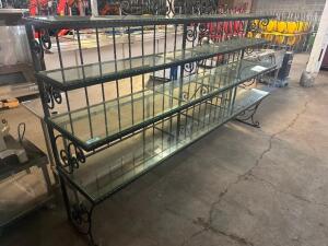 107" WROUGHT IRON FOUR TIER BAKERS RACK W/ GLASS PANEL INSERTS.